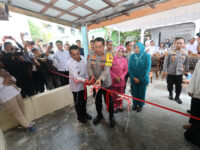 Kolaborasi Pemko Palangka Raya dengan Polda Kalteng Bedah Rumah Warga Tak Layak Huni