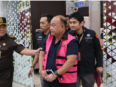 Foto Dadan Hindayana sedang menjalani proses hukum di Kejaksaan Agung Jakarta.