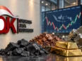 Logo OJK dengan mineral strategis dan layar perdagangan Bursa Mineral dan Komoditas Strategis.