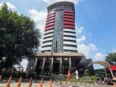 Gedung Merah Putih KPK terkait penyidikan dugaan kickback dana BNPB dari vendor proyek penanganan bencana.